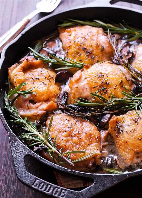 Pop chicken thighs and potatoes in one pot and roast with olives, lemon, garlic and bay leaves for a lazy weekend lunch or dinner. Garlic Rosemary Chicken Thighs - What's In The Pan?
