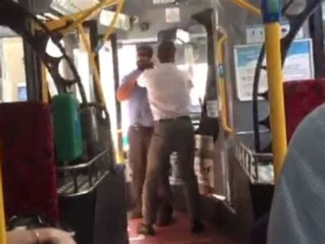 driver and passenger fight on bus and spill onto the street in morning altercation daily telegraph