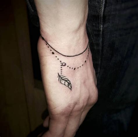 Among the prevailing tattoo trend, bracelet tattoos are the one which is the talk of the town. 40 Beautiful Bracelet Tattoos for Men & Women - TattooBlend