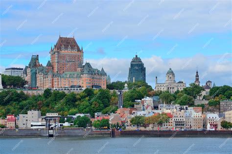 Premium Photo Quebec City Skyline Over River With Blue Sky And Cloud