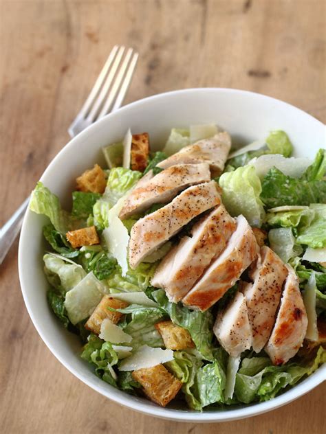 4 skinless, boneless chicken breasts, 5 ml veg oil, 4 romaine lettuce, 200 g cherry tomatoes, 2 ciabatta rolls, sea salt and ground black pepper to season, dressing, 8 g anchovy fillets, 2 garlic cloves peeled and roughly chopped, 4 tbsp tesco light mayonnaise, 3 tbsp water. Caesar Salad Recipe — Dishmaps