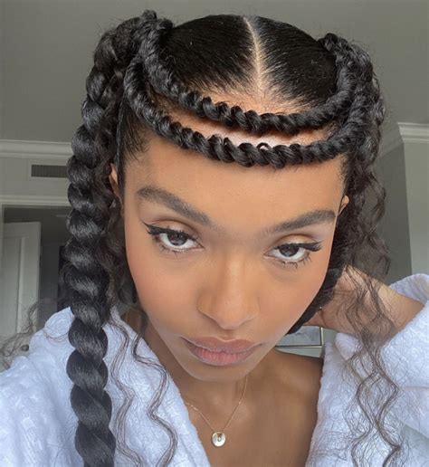 Yara Shahidi Hairstyles From Afro Curls To Braids To Blowouts