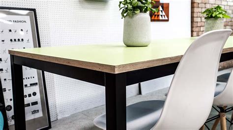 The plywood is topped with wilsonart or formica laminates. Quad Table on Castors, Plywood HPL Top