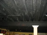 Houselogic has ideas, tips and costs for finishing your basement ceiling. My Home Redux: Painting a Basement Ceiling Black