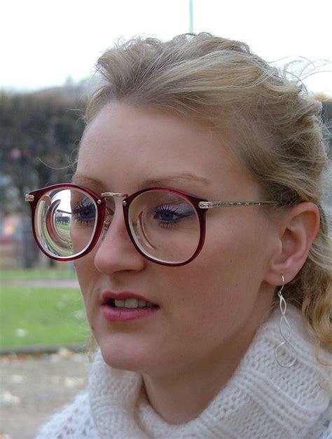 Stunning Blonde Girl With Glasses Wearing Big Round Glasses With Strong