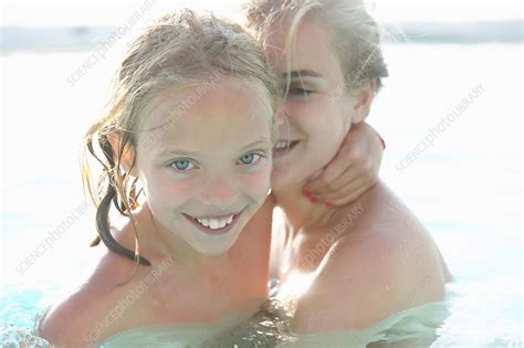 Mother And Daughter In Swimming Pool Stock Image F010 3391 Science Photo Library