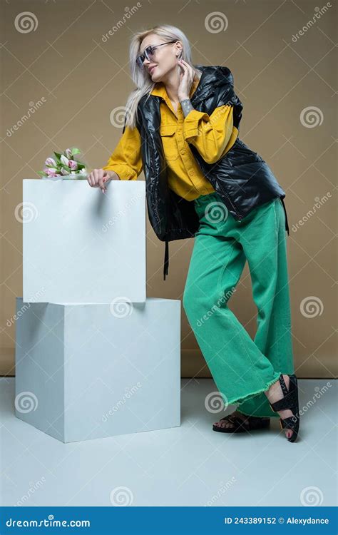 Fashion Model Girl Posing In Fashionable Clothes In Studio Casual