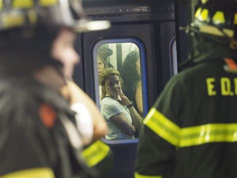 Fdny Emt Rescues Baby Boy And His Mom After A Train Derailment In