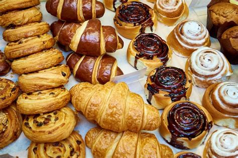 premium photo fresh baked pastries close up on a bakery showcase
