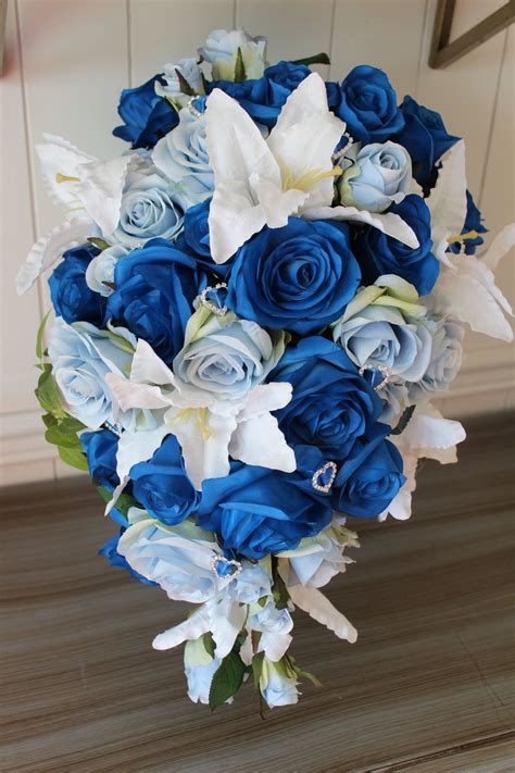 Blue wedding flowers is one of the design ideas that you can use to reference your flowers. Wedding Flowers Royal Blue | Silk flowers wedding, White ...