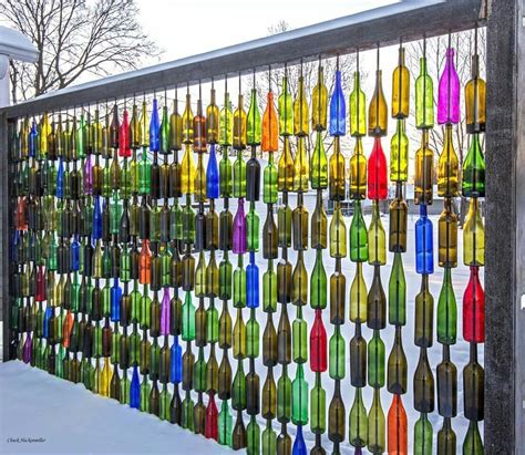 Hang old glass bottles and grow plants hydroponically. Pin by Shelden Hyde on Garden Ideas in 2020 | Wine bottle ...