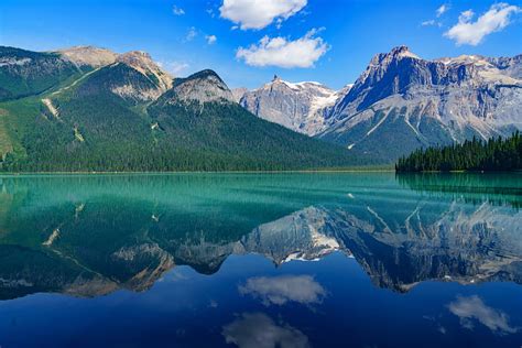 Royalty Free Photo Green Mountain Surrounded By Body Of The Water
