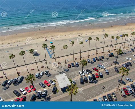 Aerial View Of Parking Lot With Cars In Front Of The Beach Stock Photo