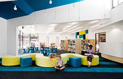Colorful Elementary Library With Unique Wave Couch Interior Design Ideas