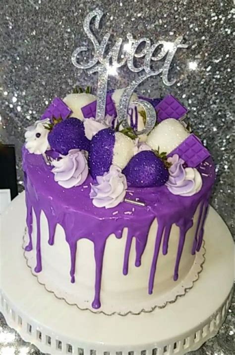 Sweet 16 Birthday Cake With Purple Icing And White Flowers