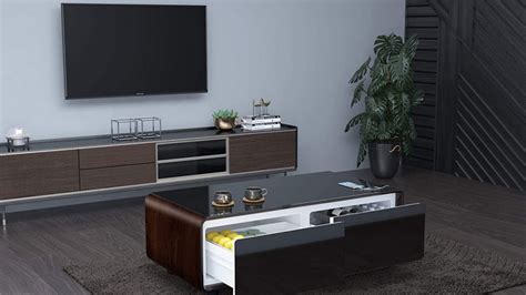 The tabletop is made from solid pine wood and has a butcher block style with visible wood grain and knots for a rustic, antique look. Best Smart Coffee Table with Refrigerator - Homeluf.com