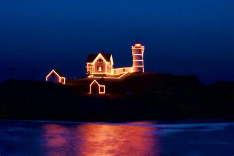 Nubble Lighthouse With Christmas Lights Photograph By Jeff Folger