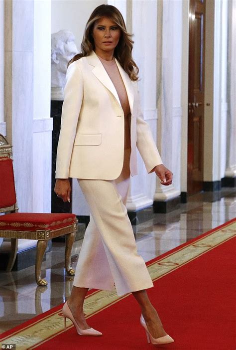 Melania Trump Wows In A Chic White Suit At Medal Of Freedom Ceremony Daily Mail Online