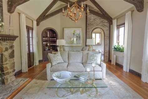 Sophisticated Traditional Living Room With Beamed Ceiling And Arches Hgtv