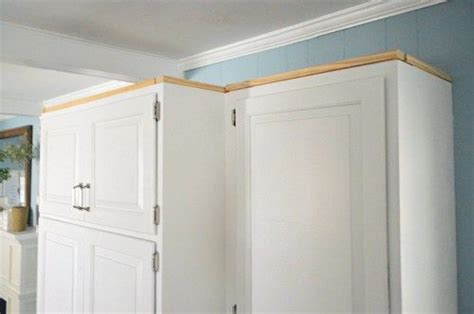No need for hammers, nail, screws, stud finders or expensive miter saws. How To Add Crown Molding To The Top Of Your Cabinets ...
