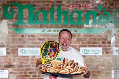 Wiener Takes All Joey Chestnut Eats 75 Hot Dogs In 10 Minutes For