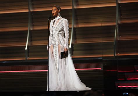 Grammys Beyonc Makes Surprise Entry Wears Sheer White Gown