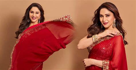 Madhuri Dixit Stuns Fans With Youthful Beauty And Classic Red Saree