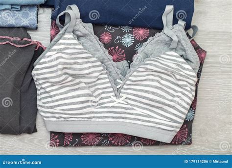 Women`s Clothing Folded Underwear A Bra And Pajamas Of Cotton Stock