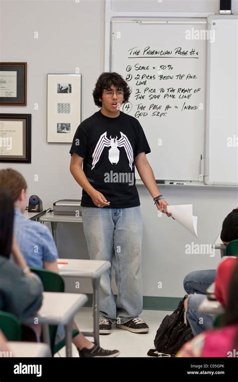 Hispanic Teenage Boy Makes Presentation In Class At Mission Early