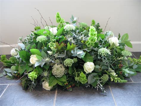 A Casket With A Natural Feel Including Thistles Cow Parsley And