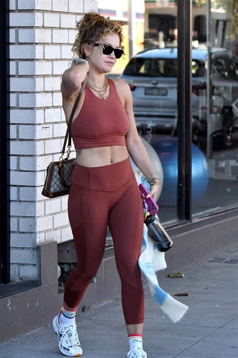 Rita Ora Shows Off Her Toned Body In Burnt Orange Sports Bra And Leggings As She Leaves The Gym
