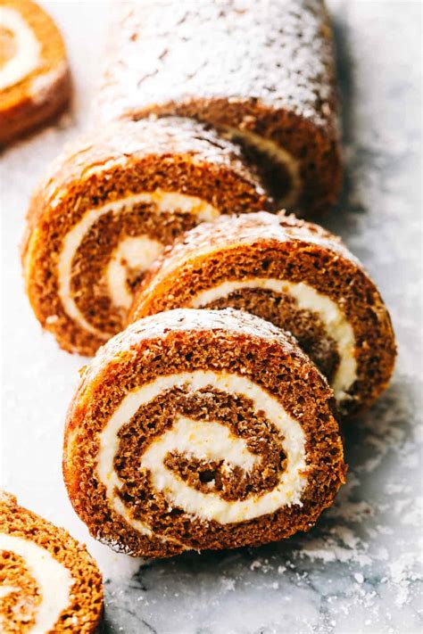 A pumpkin roll is a thin, moist pumpkin cake with or without walnuts, filled with a creamy frosting mixture this pumpkin roll recipe is the perfect cake to feature on the thanksgiving dessert table! The World's Best Pumpkin Roll | The Recipe Critic