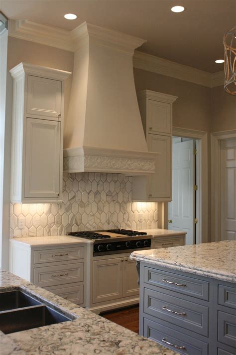 You get a very nice look with 2 cabinet heights neither of which right here, you can see one of our kitchens with 9 foot ceilings gallery, there are many picture that you can browse, don't forget to see them too. 10 foot ceiling KCC-SHOF. | Kitchen range hood, Kitchen ...