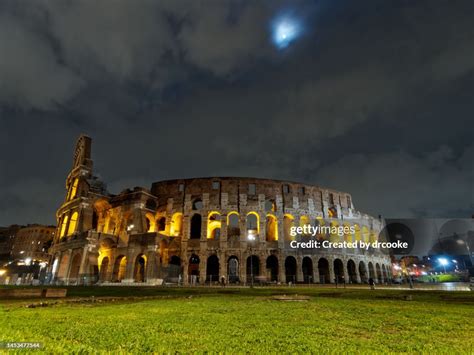 Roman Colosseum And Full Moon At Night High Res Stock Photo Getty Images