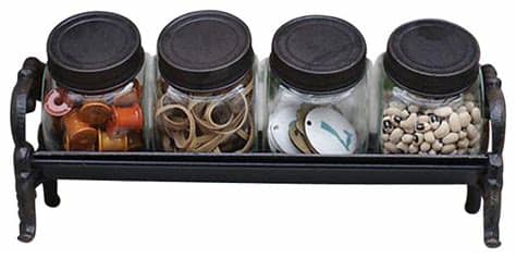 The set of two bohemian jars allows you to save your products well. Decorative Glass Jars w/ Cast Iron Lids & Rack Set ...