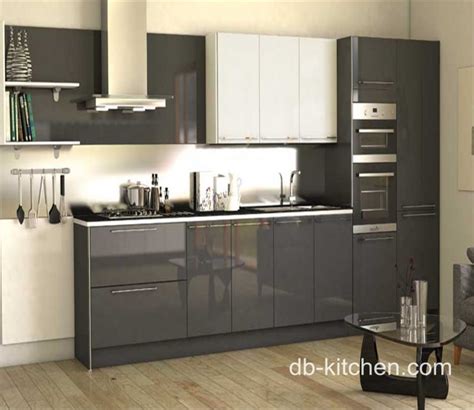 A bold, simple, stunning kitchen cabinet that has the versatility of offering textured, satin or gloss finishes. high gloss acrylic grey custom modern kitchen cabinet
