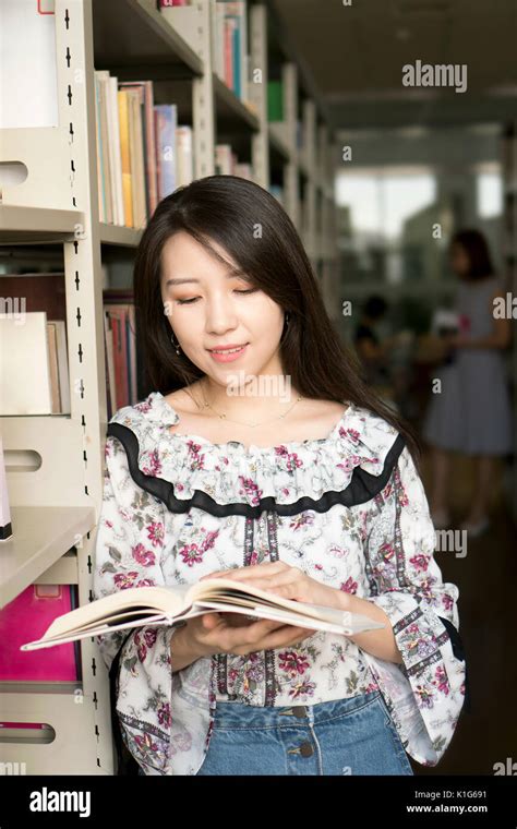 Asian Girl Reading Book Library Hi Res Stock Photography And Images Alamy