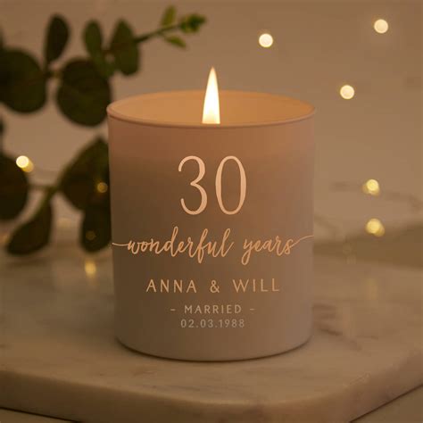 A wedding anniversary is a special event. anniversary gift for couple personalised candle by norma ...