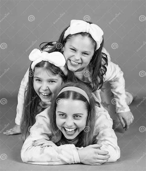 Happy Childrens Laughter Happy Girls Laughing Lying Close On Each