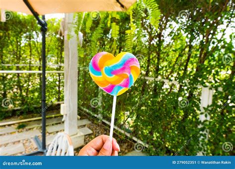 Girl Holding Rainbow Lollipop In Cafe Sweet Candy Stock Image Image Of Color Girl 279052351