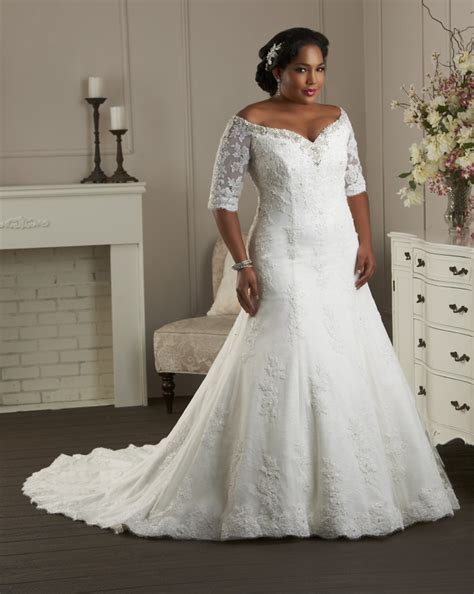 Bohemian wedding dress with long sleeves. Plus Size Wedding Dresses | DressedUpGirl.com