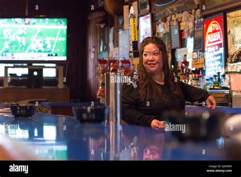 Sitka Alaska Usa August A Female Bartender Working At A