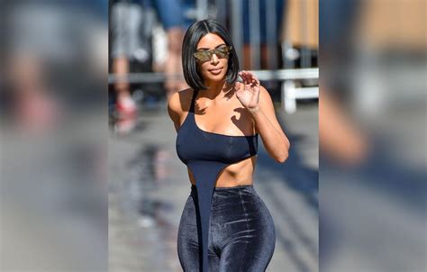 Kim Kardashians Ribs Pop Out Of Outfit After Skinny Comments