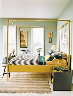 beautiful yellow bedroom hate  dust collecting fake flowers
