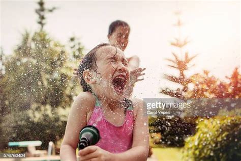 Girls In Wet Clothes Bildbanksfoton Och Bilder Getty Images