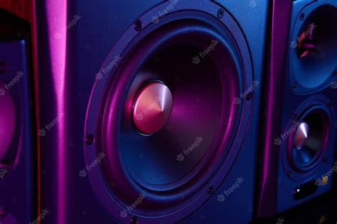 Premium Photo Two Sound Speakers And Subwoofer On Dark Background