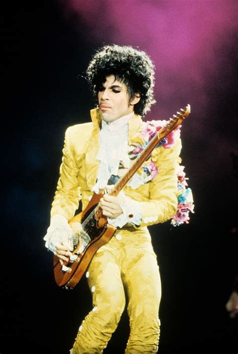 Prince Rockin Out In A Yellow Jacket During The Purple Rain Tour