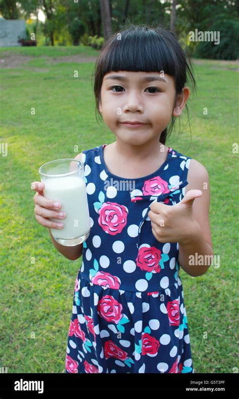 Young Girl Drinking Milk Stock Photo Alamy