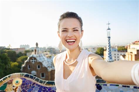 Woman Tourist Taking Selfie In Park Guell Barcelona Spain Stock Image