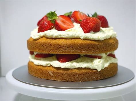 Classic Victoria Sponge Cake With Cream And Fresh Strawberries